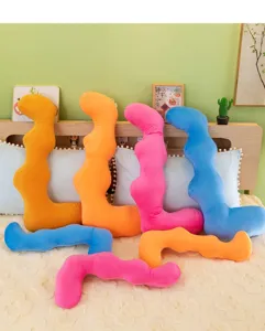 Close up view of colorful wave body pillows showing soft plush fabric and unique curved design.