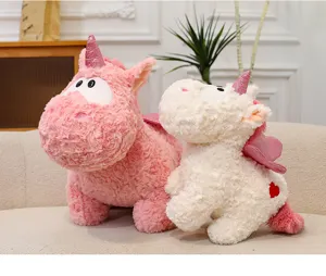 Simpatico giocattolo in peluche unicorno con corno scintillante e ali, morbido peluche per bambini.