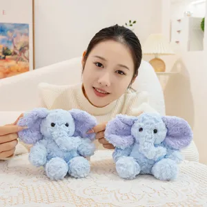 Mignon éléphant en peluche bleue d'animal en peluche douce, cadeau idéal pour les enfants.
