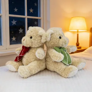 Cute bowtie teddy bear plush toy set, two soft stuffed animal dolls sitting on bed for gift.
