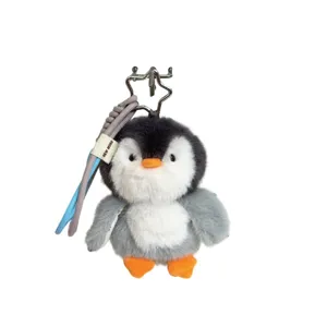 Cute plush penguin keychain with star clasp and lanyard, soft stuffed animal bag charm.