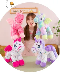 Detailed shot of cute unicorn plush toys, showing soft colorful fur, wings and starry patterns.