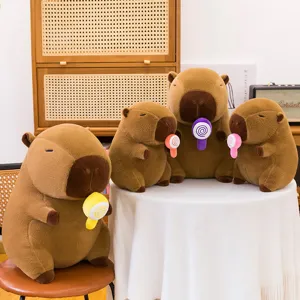 Simpatico peluche capibara con lecca-lecca morbida bambola regalo fantastico per bambini.