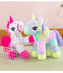 Cute rainbow unicorn plush toy with fluffy wings and sparkly eyes for kids and room decor.
