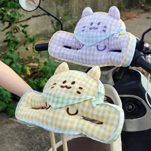 Cute cartoon grid cat anti-collision safety cushion for electric bike handlebars.