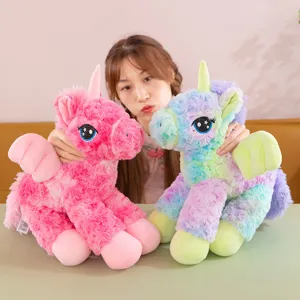 Cute plush unicorn toy with wings, soft rainbow pony doll and huggable pillow.