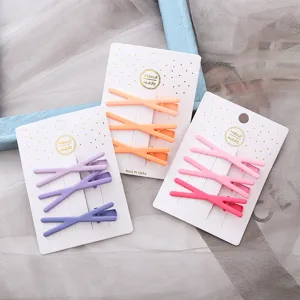 Ensemble de 3 pinces a cheveux croisees colorees mates, epingles metalliques pour femme.