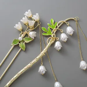 Elegant lily of the valley hair stick with pearl tassels, vintage Chinese style accessory.