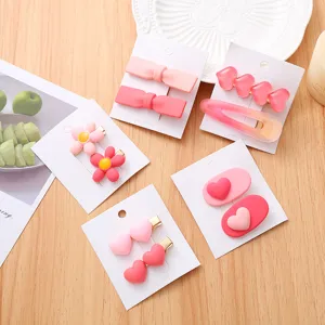 Joli ensemble de pinces à cheveux roses nœud cœur fleurs pinces bec de canard pour femmes et filles.