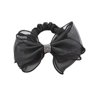 Chouchou de cheveux noeud en organza noir avec centre strass, design elegant pour femmes.