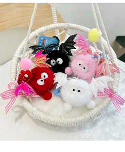 Cute fluffy bat plush keychain with googly eyes and sparkling wings for backpack or car keys.