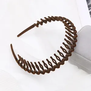 Brown flocked hair hoop close-up, zigzag non-slip design, ideal for daily washing.