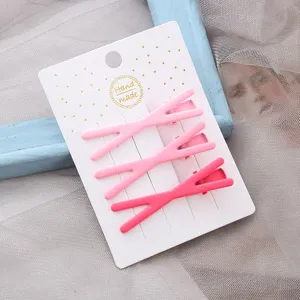 Joli ensemble de trois pinces a cheveux croisees roses accessoires de coiffure mignons