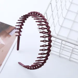 Burgundy multi-tooth anti-slip plastic headband detail view for daily face washing and hair styling.