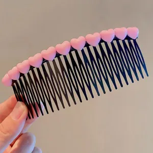 Cute pink heart insert comb detail view, lovely hair accessory for girls styling and bangs.