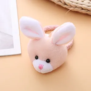 Cute plush pink bunny hair tie with soft rabbit ears, sweet autumn winter hair accessory.