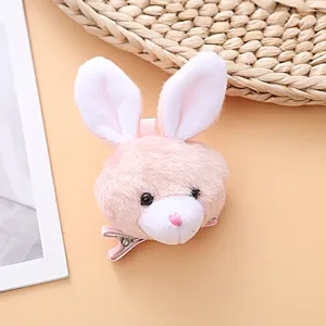 Cute pink plush bunny hair clip with soft ears, sweet style autumn winter hair accessory for girls.