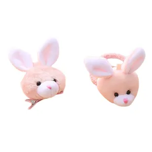 Cute plush pink rabbit hair accessories set featuring a hairpin and a hair tie with soft material.
