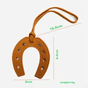 Kreativer Hufeisen Leder Taschenanhanger, orange doppelseitiger Schluesselanhanger.