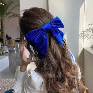 Elegant blue velvet bow hair clip for women, stylish vintage hair accessory for daily wear.