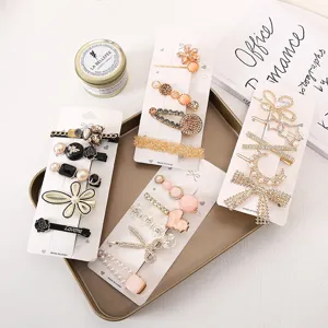Elegant pearl bow hair clips set, cute rhinestone hairpin accessories for women and daily styling.