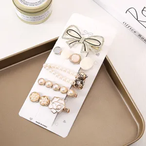 Elegant pearl bow hair clip set, sparkling rhinestone bobby pins and cute Korean style hair acc.