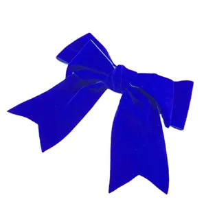 Elegant royal blue velvet bow hair clip for women, stylish fabric hairpin headwear.