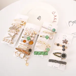 Stylish pearl and bow hair clips set, elegant Korean style hairpins for daily wear.