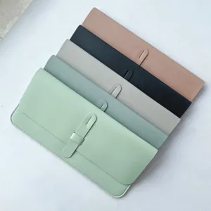Waterproof PU leather keyboard sleeve case for slim wireless keyboards, foldable storage bag.