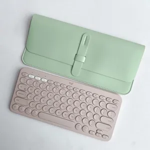 Logitech K380 keyboard protective case and wireless keyboard set, pastel green and pink.