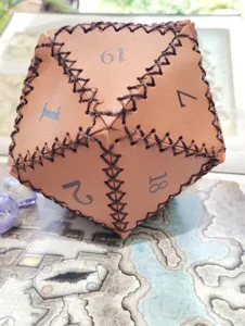 Leather D20 dice bag detailed view showcasing handcrafted stitching and clear number print.