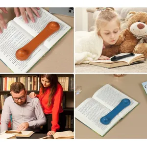 Detailed view of weighted leather bookmark holding open book pages in daily reading scenes.