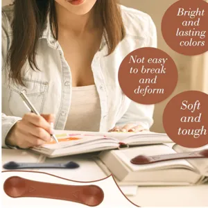 Weighted leather bookmark page holder for reading books and steady page holding.
