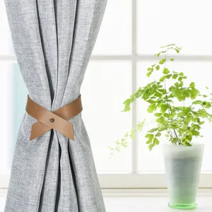Nordic style PU leather curtain tieback, punch-free cross design, elegant home decor.