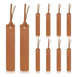 Leather bookmarks set with tassels, brown reading page markers for books, stationery office supplies.