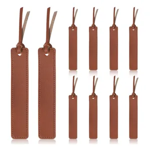 Brown leather bookmark detail showing fine stitching and tassel strap design for reading.