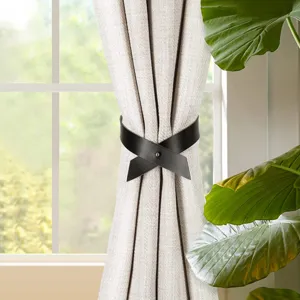 Nordic style black leather curtain tieback, punch-free cross design buckle for home decor.