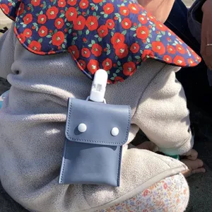 Infant pacifier storage bag with cute floral collar, portable baby pouch for daily use.