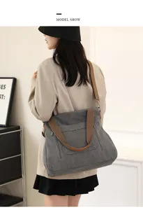 Detailed view of the casual canvas tote bag worn by the model, featuring a spacious design.
