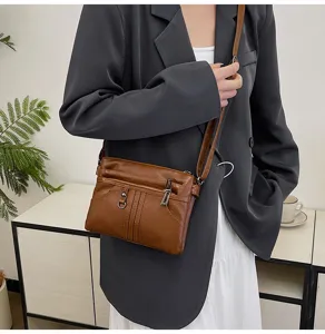 Washed soft leather crossbody bag for women, small phone shoulder bag with multi zippers.