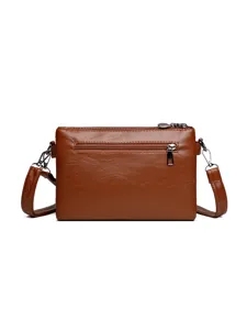 Retro brown soft leather women's crossbody shoulder bag with multi compartments for daily wear.