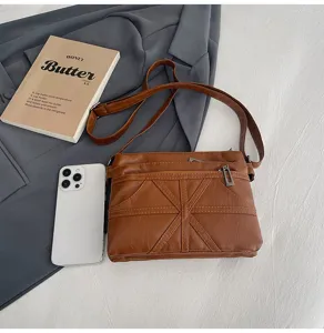 Washed soft leather crossbody bag for women, retro brown single shoulder daily messenger bag.