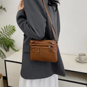 Washed soft leather women crossbody shoulder bag, multi pocket casual mobile phone handbag.