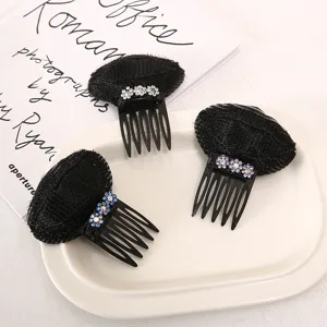 Detail view of black hair volume insert root volumizer with sparkling rhinestones for daily use.