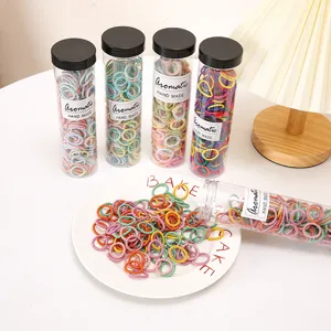 Colorful kids small hair rubber bands in clear tubes, cute daily hair styling accessories for baby.
