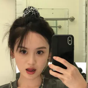 Leopard print scrunchie hair band fabric cute fashion hair accessory for women girls style.