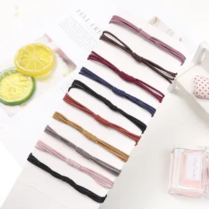Set di elastici per capelli multicolore, elastici annodati a mano per lo styling quotidiano.