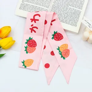 Pink strawberry print long hair ribbon scarf, cute aesthetic daily hair accessory detail.
