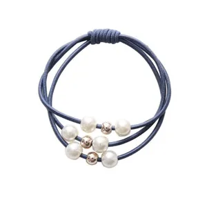 Korean style elastic hair tie with pearls and metallic beads for daily styling and elegant look.