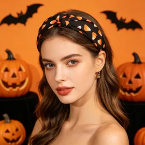 Halloween knotted hair hoop for women, stylish black candy corn print fabric headband for party.